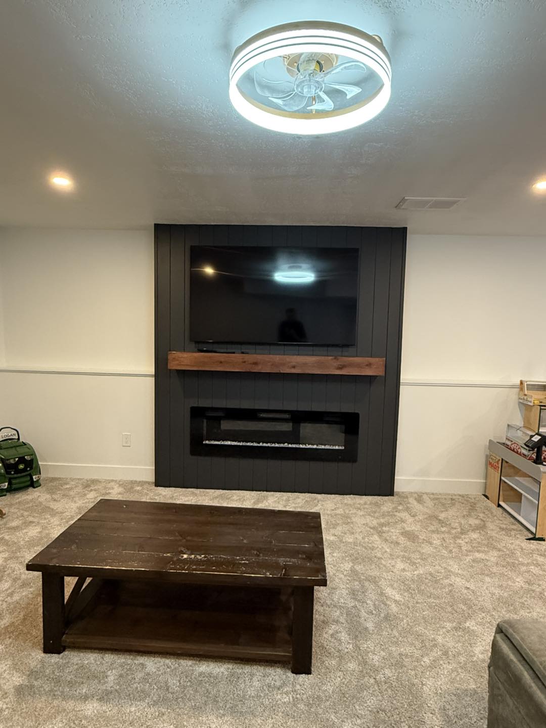 Entertainment wall with TV and fireplace